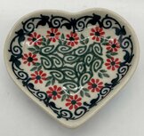 Theetip hart rode bloem