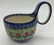 Waterscoop rode bloem met groen