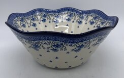 Slakom met golfrand blauwe tak