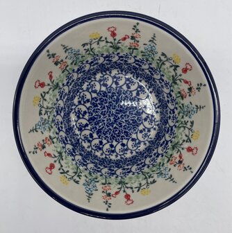 Ronde tapse kom gekleurde wilde bloemen